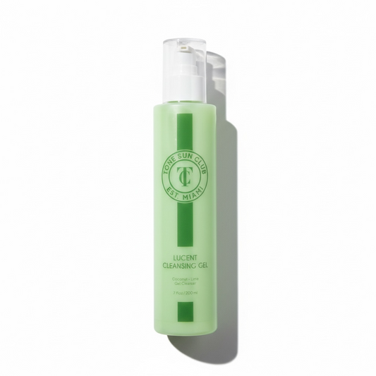 Green bottle of cleansing gel with a clear cap on a white background